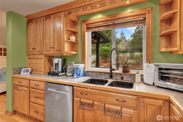 21401 161st Ave E, Graham, WA 98338 - kitchen with stainless steel dishwasher, open shelves, tile countertops, and a sink