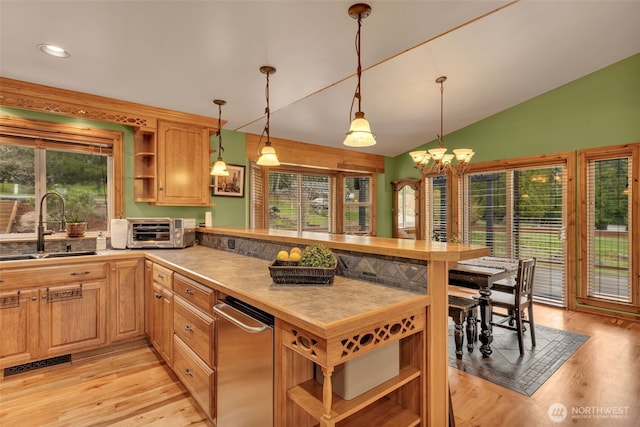 21401 161st Ave E, Graham, WA 98338 - kitchen with open shelves, a sink, a peninsula, a toaster, and lofted ceiling