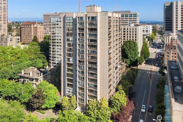 view of building exterior featuring a city view