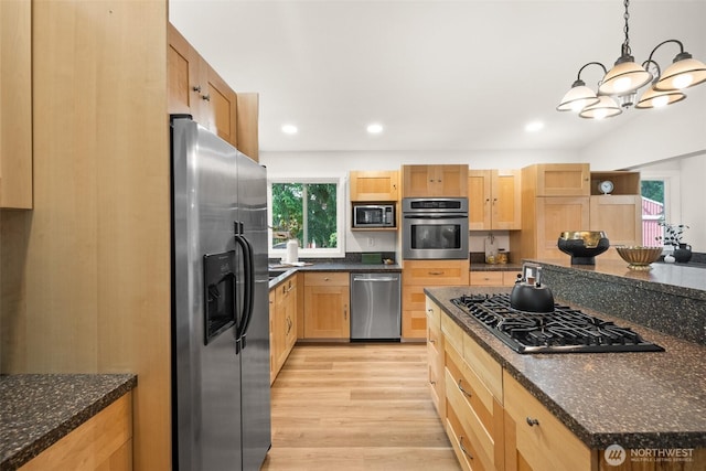 30427AVE SE 204th, Kent, WA 98042 - kitchen featuring appliances with stainless steel finishes, light wood-type flooring, light brown cabinetry, a chandelier, and recessed lighting