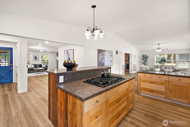 30427AVE SE 204th, Kent, WA 98042 - kitchen with open floor plan, black gas stovetop, light wood-type flooring, lofted ceiling, and a ceiling fan