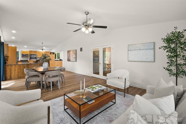 30427AVE SE 204th, Kent, WA 98042 - living area with lofted ceiling, light wood-style flooring, recessed lighting, a ceiling fan, and french doors