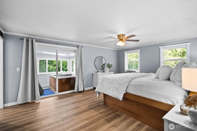 30427AVE SE 204th, Kent, WA 98042 - bedroom with crown molding, wood finished floors, and a ceiling fan