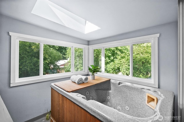 30427AVE SE 204th, Kent, WA 98042 - kitchen with a skylight, healthy amount of natural light, and brown cabinetry