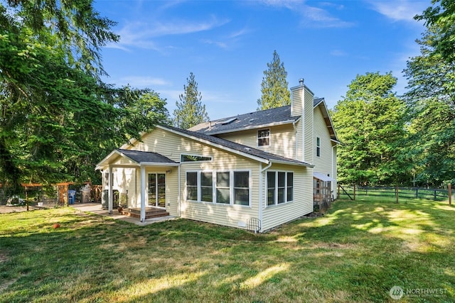 30427AVE SE 204th, Kent, WA 98042 - rear view of property featuring a patio and a chimney