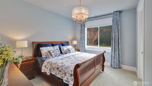 carpeted bedroom with visible vents, baseboards, and an inviting chandelier