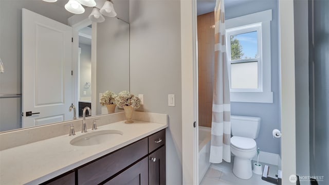 full bathroom featuring vanity, shower / tub combo, toilet, and tile patterned flooring