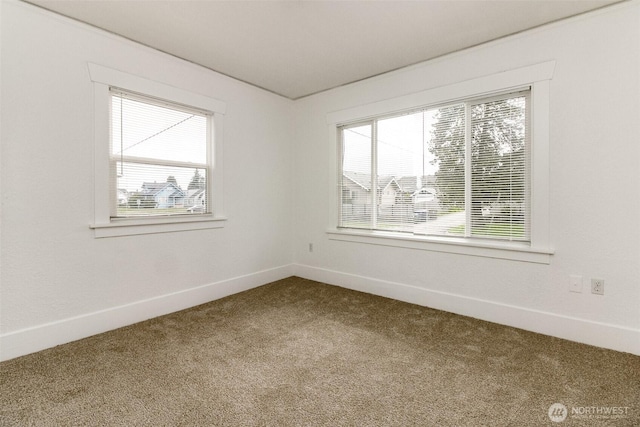 515 S 37th, Tacoma, WA 98418 - spare room featuring carpet floors, baseboards, and a healthy amount of sunlight