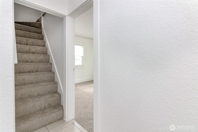 515 S 37th, Tacoma, WA 98418 - stairs featuring tile patterned floors, a textured wall, and carpet flooring