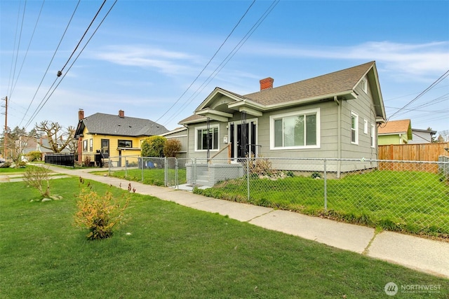515 S 37th, Tacoma, WA 98418 - bungalow with a front yard, a fenced front yard, and a chimney