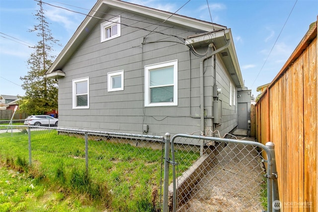 515 S 37th, Tacoma, WA 98418 - view of side of property with a gate, fence, and a yard