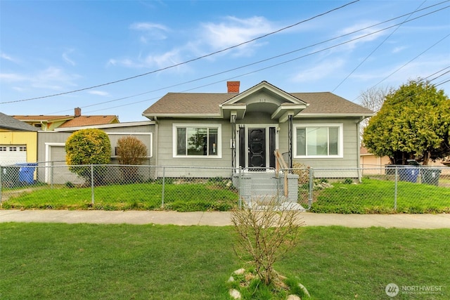 515 S 37th, Tacoma, WA 98418 - view of front of home featuring a front lawn, a chimney, a fenced front yard, and roof with shingles