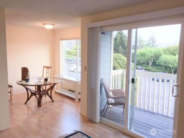 1930 Lawrence St Unit 21, Port Townsend, WA 98368 - doorway featuring healthy amount of natural light and light wood-type flooring