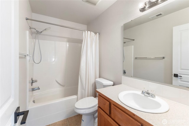 bathroom featuring tile patterned flooring, shower / tub combo with curtain, vanity, toilet, and visible vents