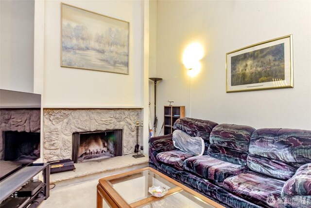 17514 151st Ave SE Unit 1-16, Renton, WA 98058 - living room featuring a premium fireplace
