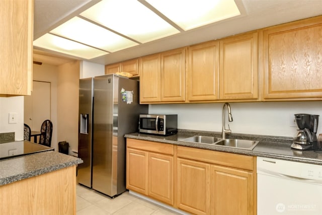 17514 151st Ave SE Unit 1-16, Renton, WA 98058 - kitchen featuring a sink, stainless steel appliances, dark countertops, and light brown cabinetry