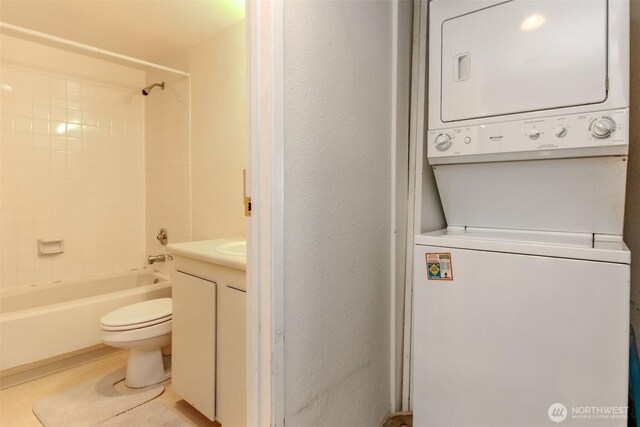 17514 151st Ave SE Unit 1-16, Renton, WA 98058 - full bath featuring shower / bathing tub combination, toilet, vanity, and stacked washing maching and dryer