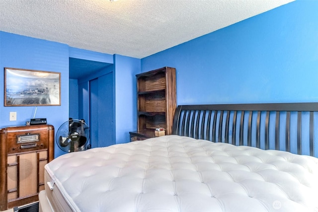 17514 151st Ave SE Unit 1-16, Renton, WA 98058 - bedroom with a textured ceiling