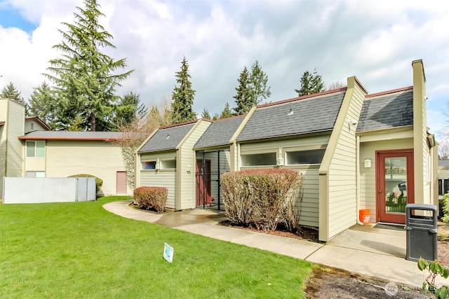 17514 151st Ave SE Unit 1-16, Renton, WA 98058 - view of front of property featuring a front yard and a shingled roof