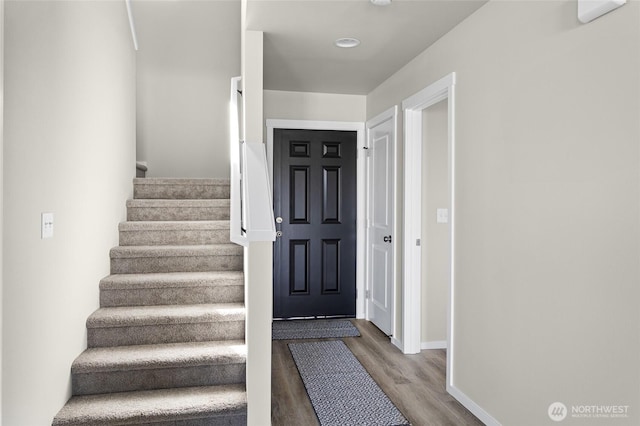 425 Pear Dr, Tieton, WA 98947 - stairs featuring baseboards and wood finished floors