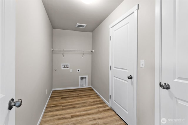 425 Pear Dr, Tieton, WA 98947 - laundry room with washer hookup, hookup for an electric dryer, light wood-style flooring, laundry area, and visible vents