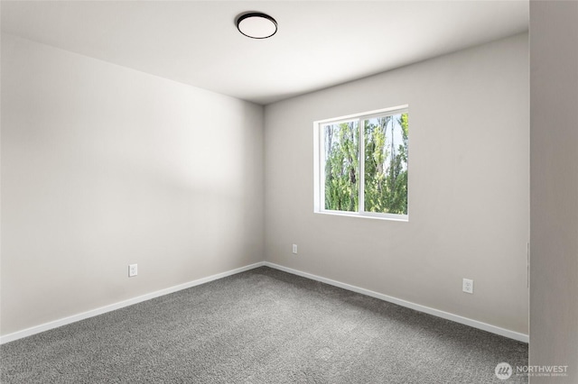 425 Pear Dr, Tieton, WA 98947 - spare room featuring carpet and baseboards