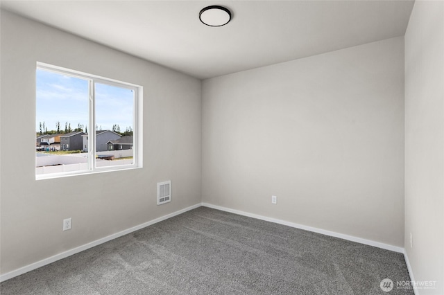 425 Pear Dr, Tieton, WA 98947 - empty room featuring baseboards, visible vents, and carpet flooring
