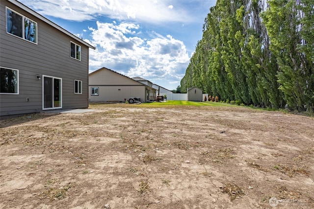 425 Pear Dr, Tieton, WA 98947 - view of yard featuring an outdoor structure and a storage unit