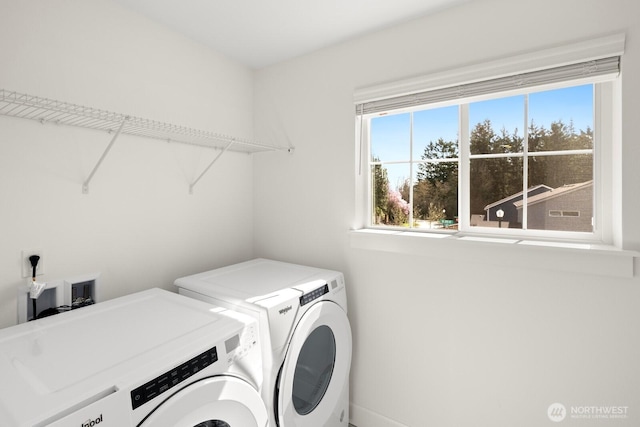 laundry area with washing machine and dryer and laundry area