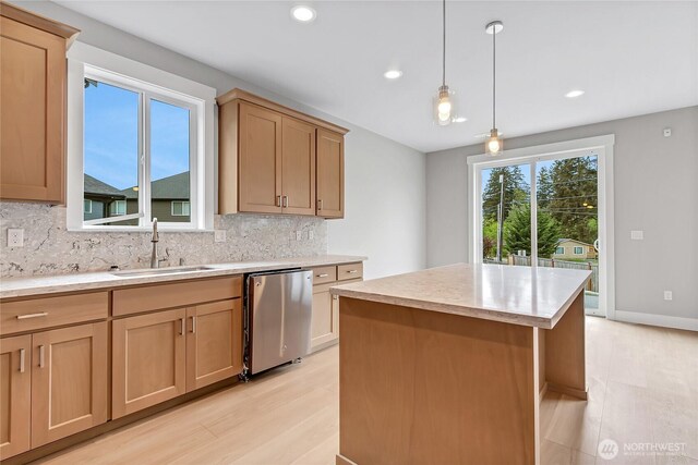 17318 74th Avenue Ct E, Puyallup, WA 98375 - kitchen with a sink, decorative backsplash, light wood-type flooring, a kitchen island, and recessed lighting