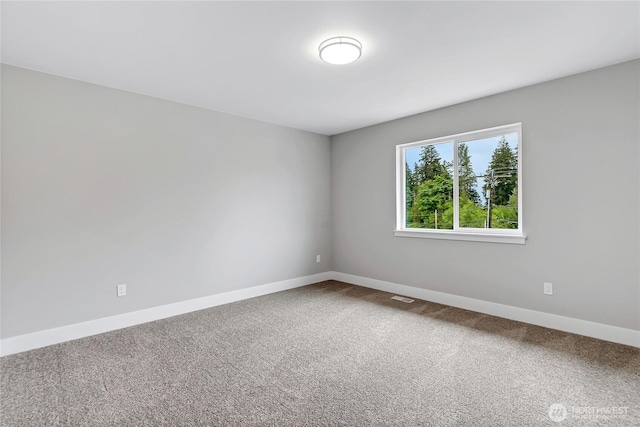 17318 74th Avenue Ct E, Puyallup, WA 98375 - carpeted spare room featuring baseboards