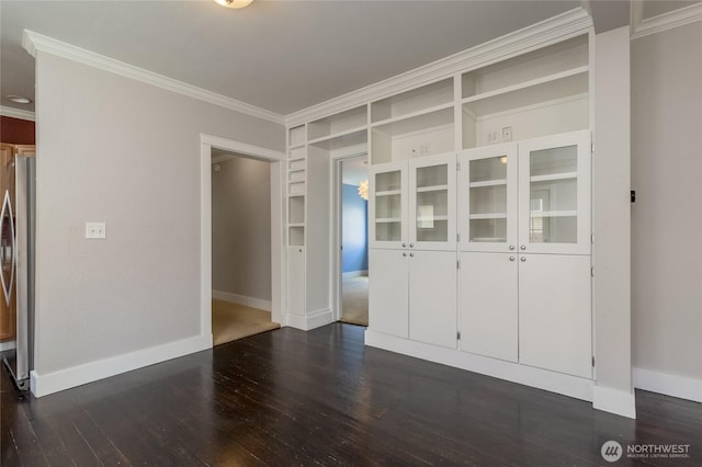 816 Washington St, Walla Walla, WA 99362 - interior space with baseboards, dark wood finished floors, ornamental molding, and built in shelves