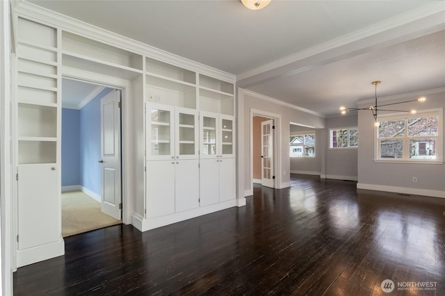 816 Washington St, Walla Walla, WA 99362 - interior space featuring crown molding, baseboards, dark wood-style floors, and a notable chandelier