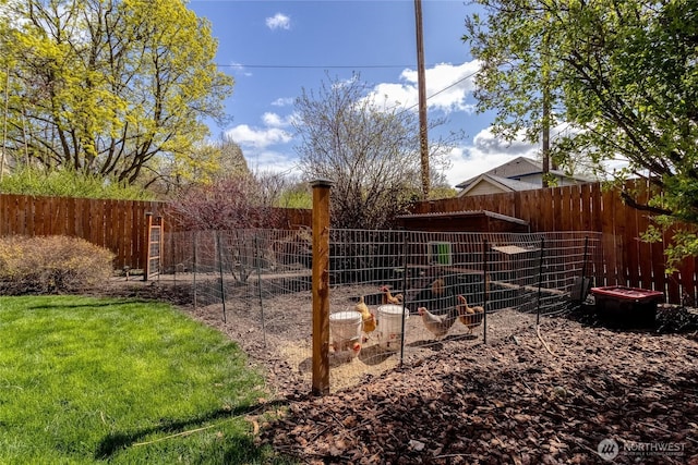 816 Washington St, Walla Walla, WA 99362 - view of yard with exterior structure, an outbuilding, and a fenced backyard