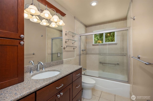 737 Park Ave NE, Bainbridge Island, WA 98110 - full bath featuring vanity, bath / shower combo with glass door, toilet, tile patterned flooring, and a chandelier