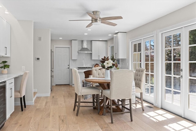 1825 112th Ave NE, Bellevue, WA 98004 - dining room with ceiling fan, visible vents, beverage cooler, light wood finished floors, and baseboards