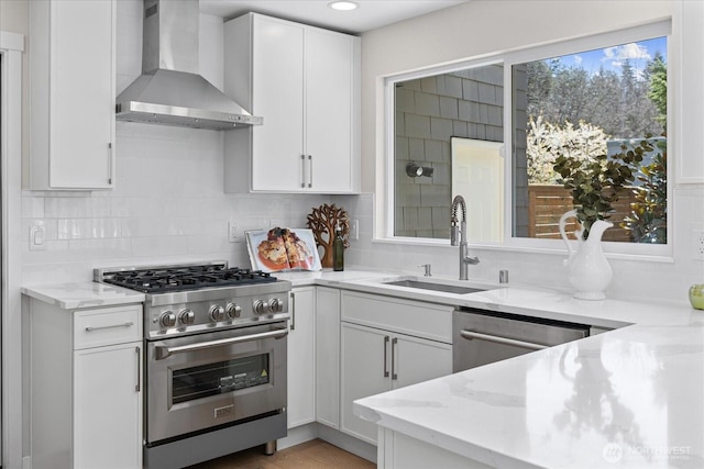 1825 112th Ave NE, Bellevue, WA 98004 - kitchen with backsplash, light stone countertops, wall chimney exhaust hood, appliances with stainless steel finishes, and a sink