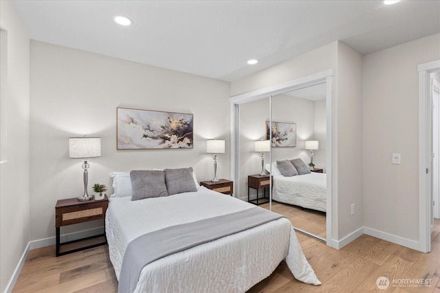 1825 112th Ave NE, Bellevue, WA 98004 - bedroom with a closet, light wood-style flooring, recessed lighting, and baseboards