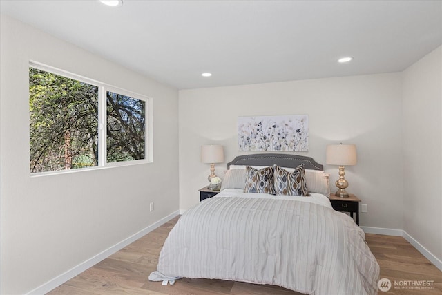 1825 112th Ave NE, Bellevue, WA 98004 - bedroom featuring baseboards, recessed lighting, and wood finished floors
