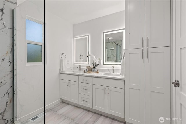 1825 112th Ave NE, Bellevue, WA 98004 - bathroom with double vanity, a marble finish shower, a sink, and visible vents