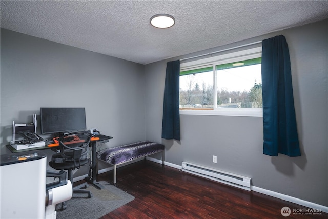 office featuring a baseboard radiator, a textured ceiling, wood finished floors, and baseboards