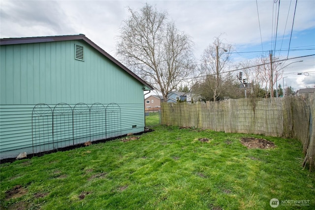 view of yard with fence