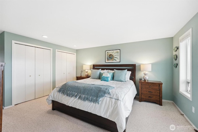 858 Livingston Bay Shore Dr, Camano Island, WA 98282 - bedroom featuring two closets, baseboards, and recessed lighting