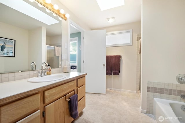 858 Livingston Bay Shore Dr, Camano Island, WA 98282 - bathroom featuring a shower stall, plenty of natural light, vanity, and a garden tub