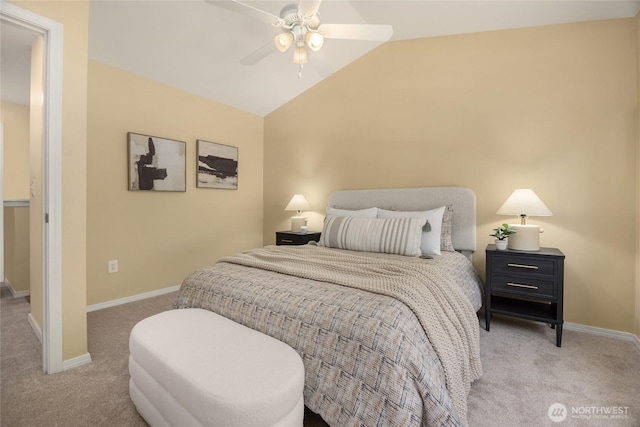 carpeted bedroom with baseboards, ceiling fan, and lofted ceiling