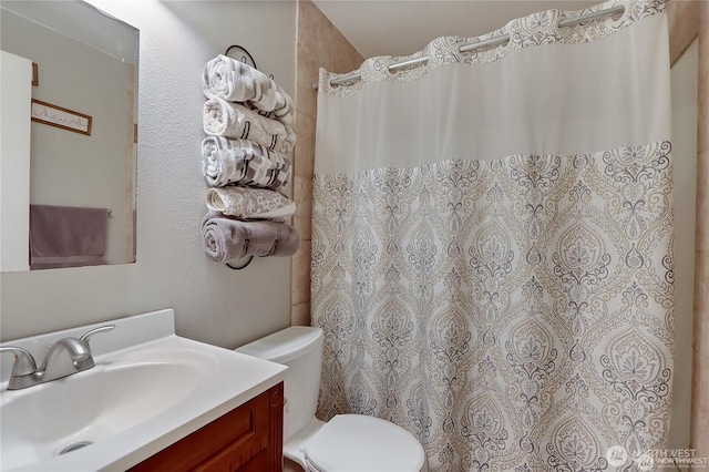 604 27th Ave SE, Puyallup, WA 98374 - bathroom with toilet, curtained shower, and vanity