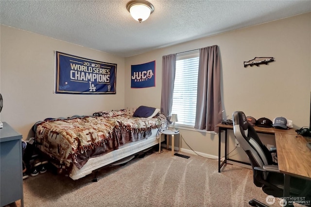 604 27th Ave SE, Puyallup, WA 98374 - carpeted bedroom with baseboards and a textured ceiling