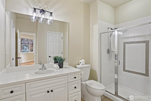2070 277th Ave SE, Sammamish, WA 98075 - bathroom with a shower stall, toilet, and vanity
