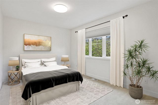 2070 277th Ave SE, Sammamish, WA 98075 - carpeted bedroom featuring baseboards