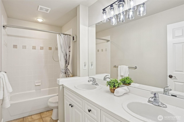 2070 277th Ave SE, Sammamish, WA 98075 - bathroom with tile patterned floors, double vanity, shower / bathtub combination with curtain, and toilet